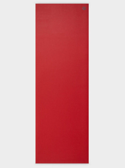 Red yoga mat on a white background