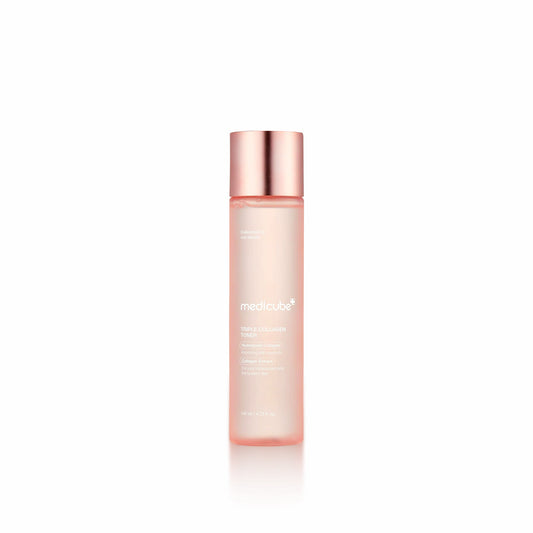 Skincare bottle with rose gold cap on a white background