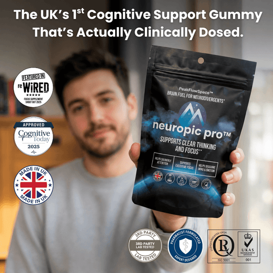 Man holding a package of neuropic pro gummies with product details and certifications displayed.