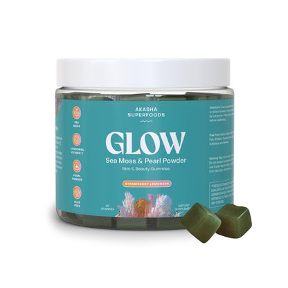 Jar of Akasha Superfoods Glow Sea Moss & Pearl Powder with two gummies on a white background