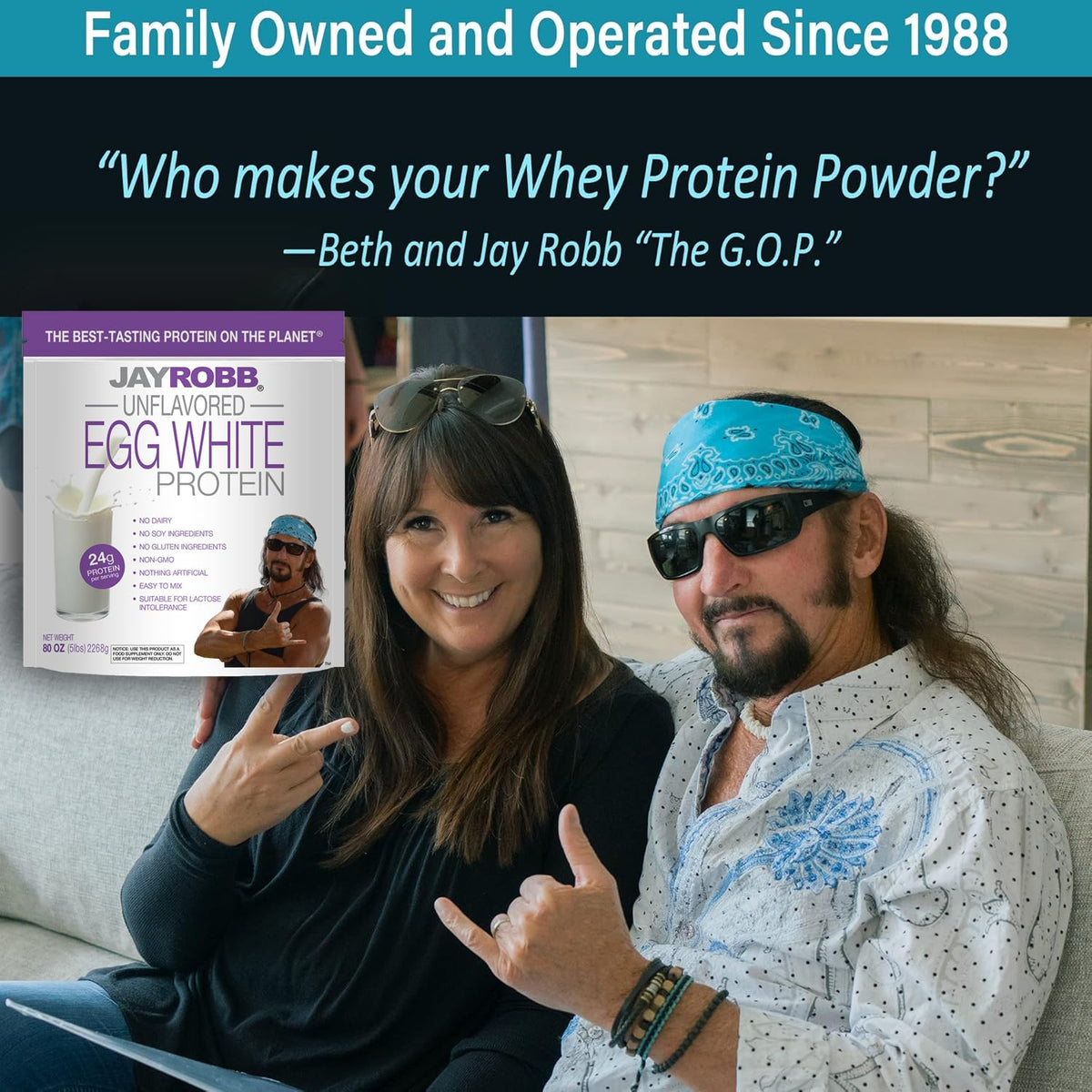 Two people sitting on a couch with a Jay Robb protein powder box in the foreground.