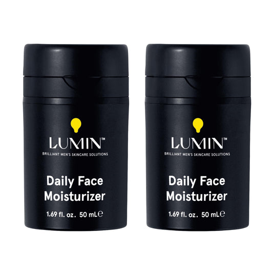 Two bottles of Lumin Daily Face Moisturizer on a white background