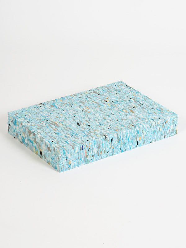 Rectangular blue mosaic tile on a white background