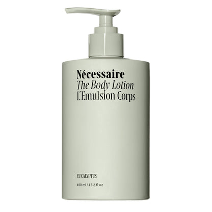 Body lotion bottle with pump on a white background