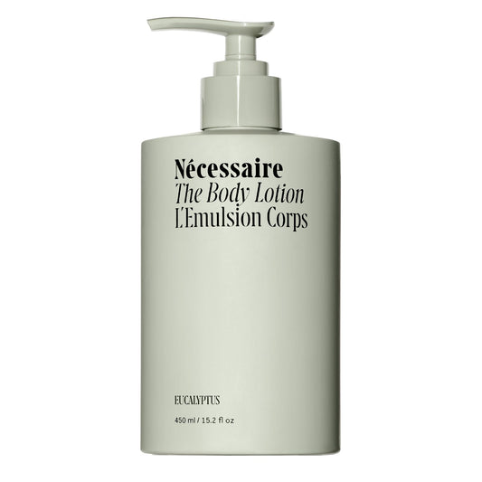 Body lotion bottle with pump on a white background
