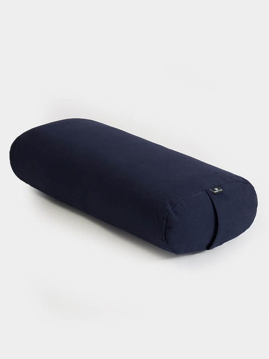 Navy blue yoga bolster on a white background