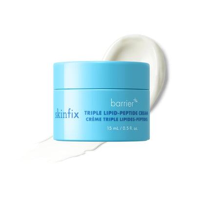Blue jar of skinfix barrier cream on a white background