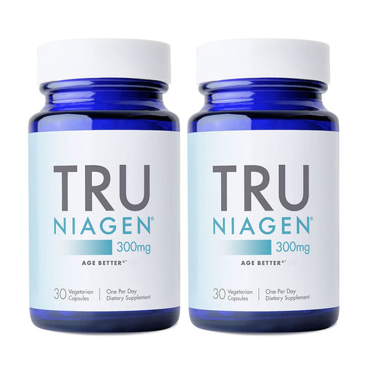 Two bottles of Tru Niagen 300mg dietary supplements on a white background