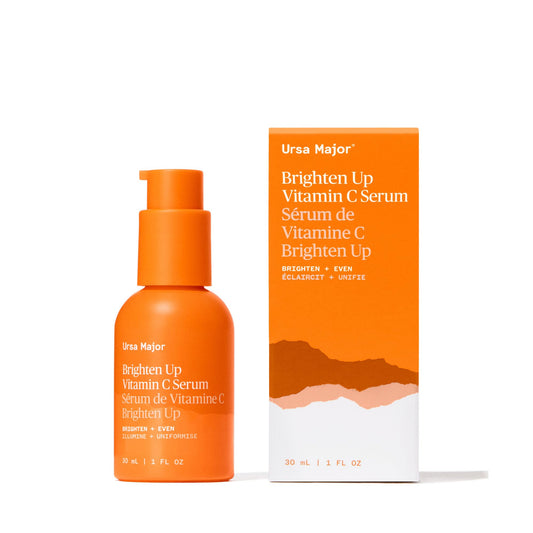 Orange serum bottle and packaging with 'Ursa Major' branding on a white background